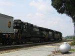 NS 8857 trails a pair of GP60's on train 213